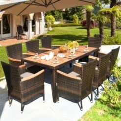 Tangkula 9PCS Rattan Patio Dining Set W/ 8 Stackable Cushioned Chairs Wooden Tabletop -Tangkula GUEST 4b126519 e336 43fb ad6b 0676193a4449