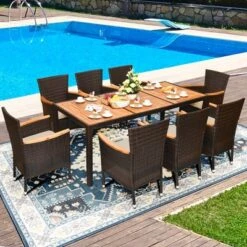 Tangkula 9PCS Rattan Patio Dining Set W/ 8 Stackable Cushioned Chairs Wooden Tabletop
